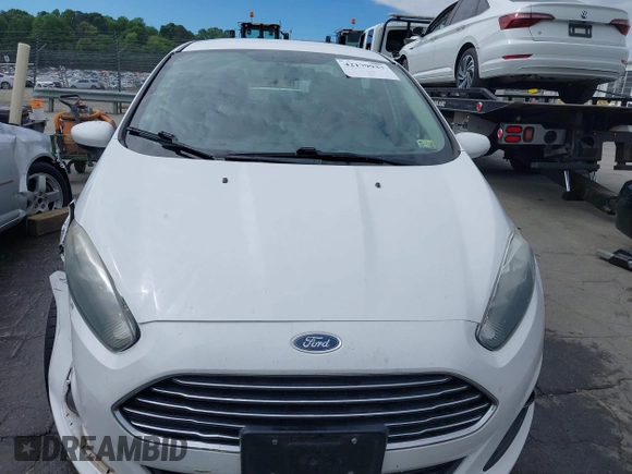 2019 Ford Fiesta SE z VIN 3FADP4BJ2KM143337, wystawiony jako IAAI lot #42179937 z przebiegiem 124 078 mil mil oraz . Historia ofert i sprzedaży dostępna na DreamBid. Obrazek 12.