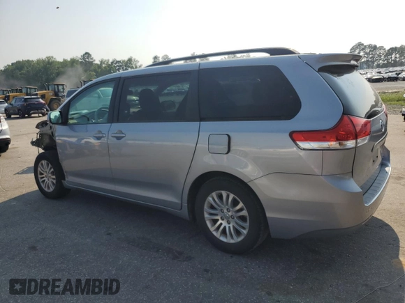 2013 Toyota Sienna XLE AAS with VIN 5TDYK3DC0DS357281, listed as a Copart auction lot 61640645 with 69,262 mi miles and Salvage title. Bid and sale history available at DreamBid. Image 2.
