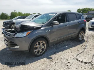 2013 Ford Escape SEL z VIN 1FMCU9H97DUB39027, wystawiony jako Copart lot #57816995 z przebiegiem 205 091 mil mil oraz Czysty tytuł • Clean title. Historia ofert i sprzedaży dostępna na DreamBid. Obrazek 1.