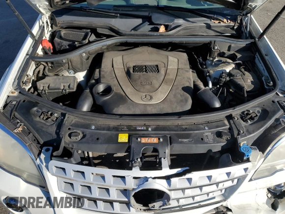 2010 Mercedes-Benz M 550 with VIN 4JGBB7CB8AA602077, listed as a Copart auction lot 83598804 with 111,633 mi miles and Salvage Title. Bid and sale history available at DreamBid. Image 12.