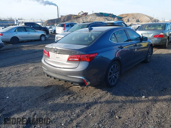 2019 Acura TLX with VIN 19UUB2F30KA002614, listed as a IAAI auction lot 41569334 with 96,320 mi miles and . Bid and sale history available at DreamBid. Image 4.