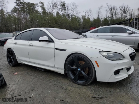 2013 BMW 6 Series 640i with VIN WBA6A0C55DDZ03819, listed as a Copart auction lot 85010154 with 129,968 mi miles and Salvage Title. Bid and sale history available at carsss.com. Image 4.