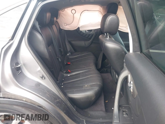 2013 Infiniti FX with VIN JN8CS1MU8DM141556, listed as a IAAI auction lot 41536047 with 96,016 mi miles and . Bid and sale history available at DreamBid. Image 8.