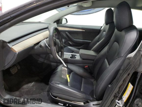2023 Tesla Model 3 with VIN 5YJ3E1EA4PF452809, listed as a Copart auction lot 63688885 with 125,442 mi miles and Clean title. Bid and sale history available at DreamBid. Image 7.