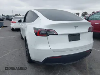 2024 Tesla Model Y with VIN 7SAYGDED6RF166543, listed as a IAAI auction lot 41713362 with Not Provided miles and . Bid and sale history available at DreamBid. Image 3.