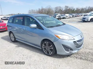 2012 Mazda Mazda5 Grand Touring with VIN JM1CW2DL1C0142664, listed as a IAAI auction lot 41585909 with 211,875 mi miles. Bid and sale history available at carsss.com. Image 1.