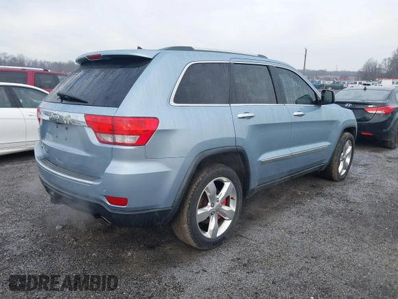 2013 Jeep Grand Cherokee Overland with VIN 1C4RJFCT2DC572978, listed as a IAAI auction lot 41468915 with 223,528 mi miles. Bid and sale history available at carsss.com. Image 4.