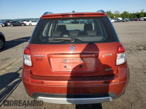 2009 Suzuki SX4 Touring AWD z VIN JS2YB417X96201551, wystawiony jako Copart lot #56630665 z przebiegiem 109 297 mil mil oraz Szkoda całkowita • Salvage title. Historia ofert i sprzedaży dostępna na DreamBid. Obrazek 6.