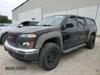2010 GMC Canyon SLE1 with VIN 1GTJTCDE0A8136926, listed as a Copart auction lot 76193164 with 214,608 mi miles and Salvage Title. Bid and sale history available at carsss.com. Image 1.