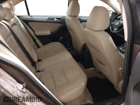 2014 Volkswagen Jetta TDI w/Premium with VIN 3VWLL7AJ1EM358214, listed as a IAAI auction lot 42148435 with 174,923 mi miles and . Bid and sale history available at DreamBid. Image 8.