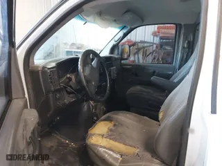 2007 Chevrolet Express Cargo Van with VIN 1GCFG15X571105039, listed as a IAAI auction lot 41763534 with 134,696 mi miles. Bid and sale history available at carsss.com. Image 5.
