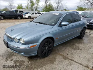 2005 Jaguar X-Type 3.0L with VIN SAJWA51AX5WE66748, listed as a Copart auction lot 49601374 with 129,709 mi miles and Salvage Title. Bid and sale history available at carsss.com. Image 1.