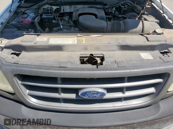 2003 Ford F-150 XL z VIN 2FTPF17ZX3CA65314, wystawiony jako Copart lot #56379215 z przebiegiem 112 475 mil mil oraz Czysty tytuł • Clean title. Historia ofert i sprzedaży dostępna na DreamBid. Obrazek 11.