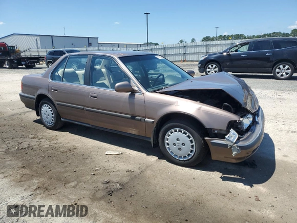 1991 Honda Accord z VIN 1HGCB7657MA200443, wystawiony jako Copart lot #67918464 z przebiegiem 94 601 mil mil oraz Szkoda całkowita • Salvage title. Historia ofert i sprzedaży dostępna na DreamBid. Obrazek 4.