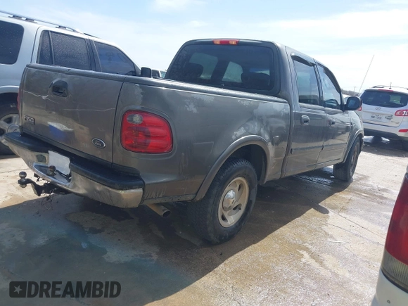 2003 Ford F-150 XLT with VIN 1FTRW076X3KA76379, listed as a IAAI auction lot 41821131 with 221,081 mi miles. Bid and sale history available at carsss.com. Image 4.