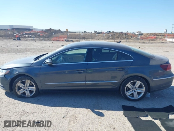 2013 Volkswagen CC Sport with VIN WVWBN7AN0DE551132, listed as a IAAI auction lot 41849514 with 144,557 mi miles. Bid and sale history available at carsss.com. Image 14.