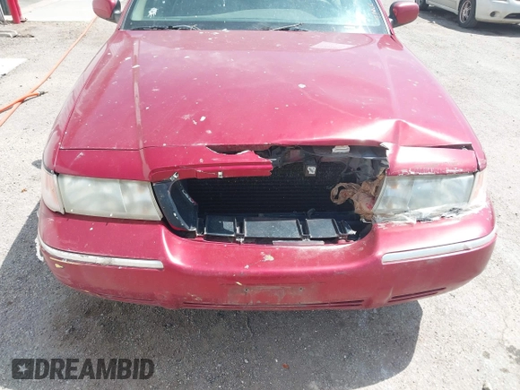 1999 Mercury Grand Marquis GS z VIN 2MEFM74W2XX635561, wystawiony jako IAAI lot #41982451 z przebiegiem 233 137 mil mil oraz . Historia ofert i sprzedaży dostępna na DreamBid. Obrazek 6.