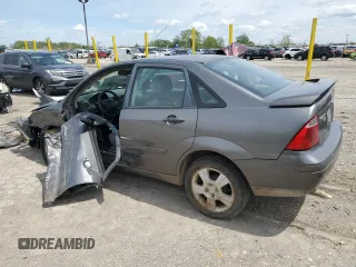 2007 Ford Focus S z VIN 1FAHP34N17W103625, wystawiony jako Copart lot #55300395 z przebiegiem 82 041 mil mil oraz Szkoda całkowita • Salvage title. Historia ofert i sprzedaży dostępna na DreamBid. Obrazek 2.