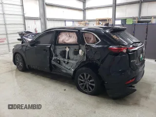 2021 Mazda CX-9 Touring with VIN JM3TCACY4M0523188, listed as a Copart auction lot 48595205 with 99,999 mi miles and Clean title. Bid and sale history available at DreamBid. Image 2.
