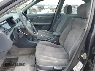2001 Toyota Camry CE z VIN 4T1BG22K31U795050, wystawiony jako Copart lot #55054025 z przebiegiem 161 228 mil mil oraz Szkoda całkowita • Salvage title. Historia ofert i sprzedaży dostępna na DreamBid. Obrazek 7.