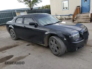 2006 Chrysler 300 C with VIN 2C3LK63H56H142364, listed as a Copart auction lot 74954374 with 124,550 mi miles and Salvage Title. Bid and sale history available at carsss.com. Image 4.