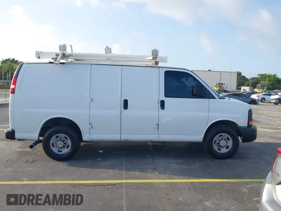 2013 Chevrolet Express Cargo with VIN 1GCWGFCG2D1144523, listed as a IAAI auction lot 41729515 with 282,755 mi miles and . Bid and sale history available at DreamBid. Image 13.