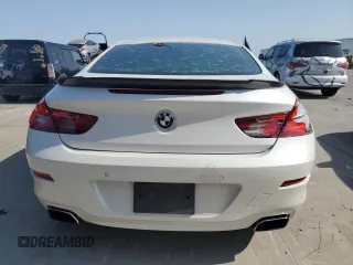 2012 BMW 6 Series 650i xDrive z VIN WBALX5C5XCC894182, wystawiony jako Copart lot #60100065 z przebiegiem 110 187 mil mil oraz Szkoda całkowita • Salvage title. Historia ofert i sprzedaży dostępna na DreamBid. Obrazek 6.