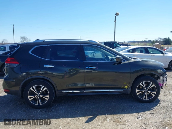 2017 Nissan Rogue SL with VIN JN8AT2MT8HW395084, listed as a IAAI auction lot 41858587 with 219,849 mi miles and . Bid and sale history available at DreamBid. Image 13.