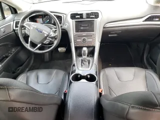 2016 Ford Fusion Titanium z VIN 3FA6P0K90GR399896, wystawiony jako Copart lot #63504265 z przebiegiem 37 066 mil mil oraz Szkoda całkowita • Salvage title. Historia ofert i sprzedaży dostępna na DreamBid. Obrazek 8.
