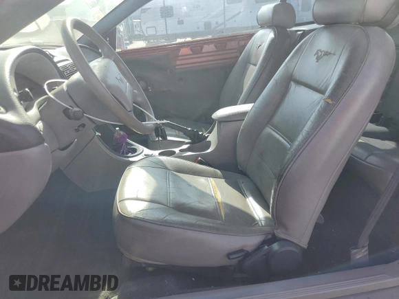 2002 Ford Mustang Deluxe with VIN 1FAFP44462F174929, listed as a Copart auction lot 61975925 with 110,825 mi miles and Salvage title. Bid and sale history available at DreamBid. Image 7.