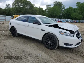 2013 Ford Taurus Limited с VIN 1FAHP2F89DG226774, выставлен на аукционе Copart как лот 57250415 с пробегом 233 149 миль миль и Списание • Salvage title. История ставок и продаж доступна на DreamBid. Изображение 4.