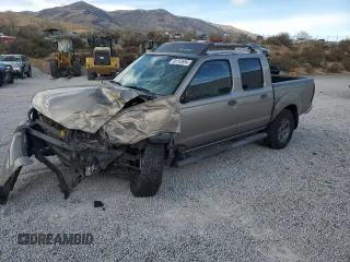 2003 Nissan Frontier XE with VIN 1N6ED27T73C433384, listed as a Copart auction lot 80153654 with 248,803 mi miles and Salvage title. Bid and sale history available at DreamBid. Image 1.
