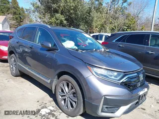 2021 Honda CR-V Touring with VIN 7FARW2H9XME012480, listed as a IAAI auction lot 41632487 with 59,684 mi miles. Bid and sale history available at carsss.com. Image 1.
