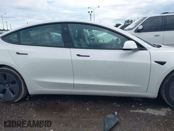 2023 Tesla Model 3 z VIN 5YJ3E1EA0PF511158, wystawiony jako IAAI lot #42210455 z przebiegiem 22 291 mil mil oraz . Historia ofert i sprzedaży dostępna na DreamBid. Obrazek 13.