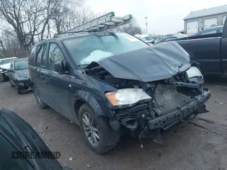 2014 Dodge Grand Caravan SXT with VIN 2C4RDGCG8ER257837, listed as a IAAI auction lot 41211629 with 139,231 mi miles and . Bid and sale history available at DreamBid. Image 1.