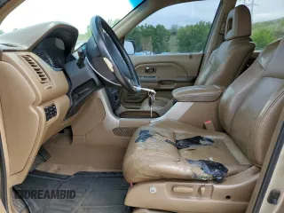 2005 Honda Pilot EX-L z VIN 2HKYF185X5H531689, wystawiony jako Copart lot #58273755 z przebiegiem 212 924 mil mil oraz Nie do naprawy • Non repairable. Historia ofert i sprzedaży dostępna na DreamBid. Obrazek 7.