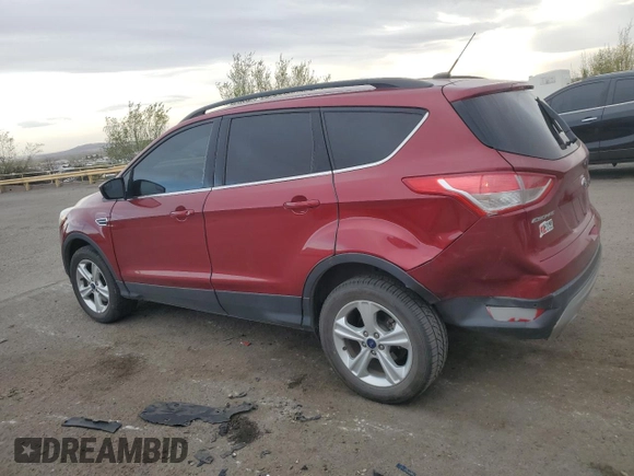 2016 Ford Escape SE with VIN 1FMCU9G95GUC83472, listed as a Copart auction lot 51119535 with 104,707 mi miles and Salvage Title. Bid and sale history available at carsss.com. Image 2.
