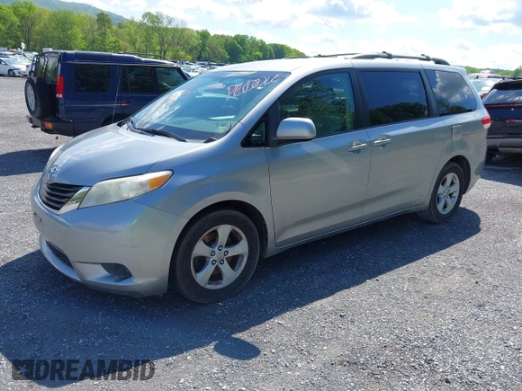 2011 Toyota Sienna LE AAS with VIN 5TDKK3DC2BS175598, listed as a IAAI auction lot 42186153 with 169,267 mi miles. Bid and sale history available at carsss.com. Image 2.