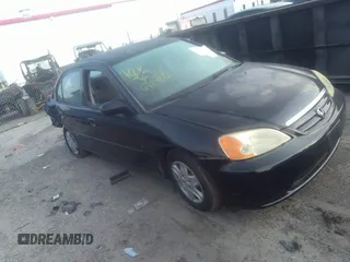 2003 Honda Civic LX with VIN 2HGES16563H602363, listed as a IAAI auction lot 40123995 with 165,413 mi miles. Bid and sale history available at carsss.com. Image 1.