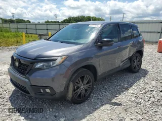 2021 Honda Passport EX-L with VIN 5FNYF8H54MB002017, listed as a Copart auction lot 59850975 with 54,275 mi miles and Salvage title. Bid and sale history available at DreamBid. Image 1.