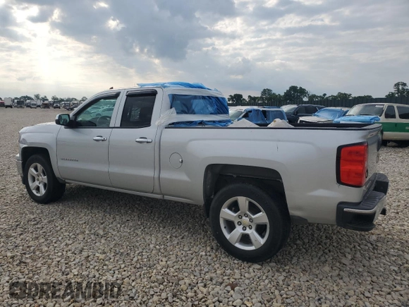 2015 Chevrolet Silverado 1500 LS with VIN 1GCRCPEH1FZ335827, listed as a Copart auction lot 50414585 with 214,079 mi miles and Salvage Title. Bid and sale history available at DreamBid. Image 2.