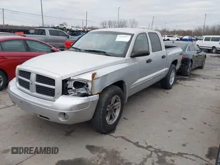 2007 Dodge Dakota SLT z VIN 1D7HW48K77S129162, wystawiony jako IAAI lot #41842077 z przebiegiem 186 172 mil mil oraz . Historia ofert i sprzedaży dostępna na DreamBid. Obrazek 2.