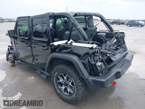 2021 Jeep Wrangler Unlimited Rubicon with VIN 1C4HJXFG7MW662092, listed as a IAAI auction lot 42139521 with 32,055 mi miles and . Bid and sale history available at DreamBid. Image 3.