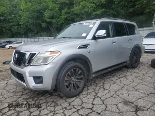 2017 Nissan Armada Platinum z VIN JN8AY2ND1H9010763, wystawiony jako Copart lot #59471045 z przebiegiem 141 588 mil mil oraz Czysty tytuł • Clean title. Historia ofert i sprzedaży dostępna na DreamBid. Obrazek 1.