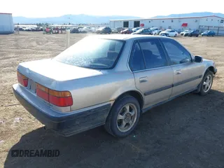 1991 Honda Accord LX with VIN JHMCB7656MC028293, listed as a IAAI auction lot 41992201 with 191,514 mi miles. Bid and sale history available at carsss.com. Image 4.