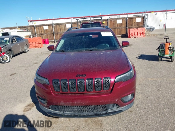 2019 Jeep Cherokee Latitude Plus with VIN 1C4PJMLX5KD456292, listed as a IAAI auction lot 40940110 with 95,622 mi miles and . Bid and sale history available at DreamBid. Image 12.