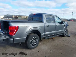 2023 Ford F-150 XL with VIN 1FTEW1EPXPFB48020, listed as a IAAI auction lot 41219055 with 7,405 mi miles. Bid and sale history available at carsss.com. Image 4.