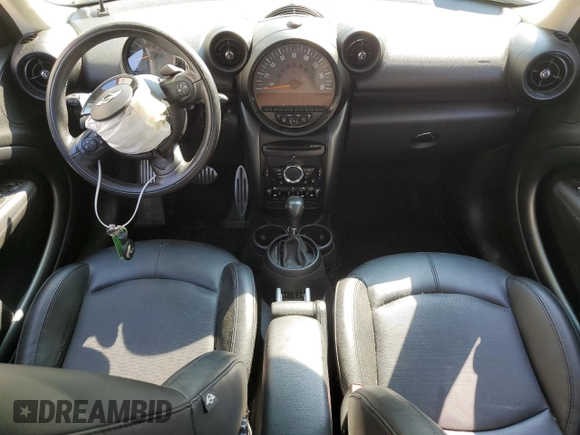 2015 MINI Countryman S with VIN WMWZC5C53FWP49039, listed as a Copart auction lot 60200335 with Not provided miles and Salvage title. Bid and sale history available at DreamBid. Image 8.