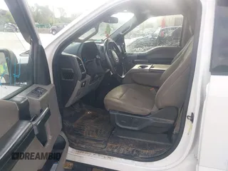 2019 Ford F-150 XL with VIN 1FTEW1E50KFA47687, listed as a IAAI auction lot 42021043 with 129,337 mi miles. Bid and sale history available at carsss.com. Image 5.