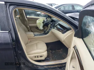 2014 Ford Taurus Limited with VIN 1FAHP2F87EG130532, listed as a IAAI auction lot 41618112 with 118,474 mi miles. Bid and sale history available at carsss.com. Image 5.